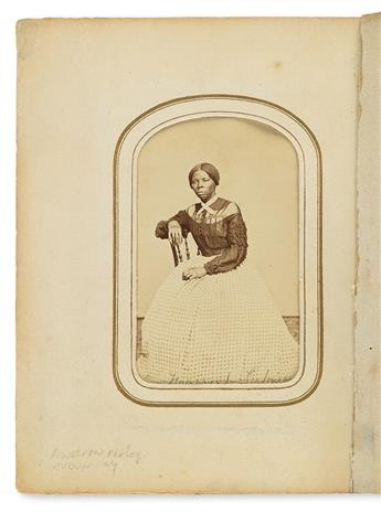 (SLAVERY AND ABOLITION.) PHOTOGRAPHY. Civil War-period carte-de-visite album, including two photographs of Harriet Tubman, one of them